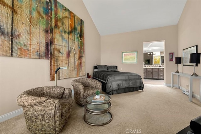 20 Delphinus Unit 20, Irvine, CA 92603 - bedroom featuring carpet floors, baseboards, vaulted ceiling, and ensuite bath