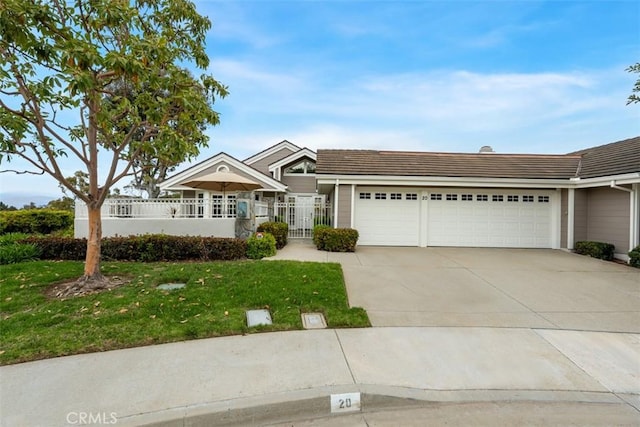 20 Delphinus Unit 20, Irvine, CA 92603 - ranch-style home with a tiled roof, driveway, a front yard, fence, and an attached garage