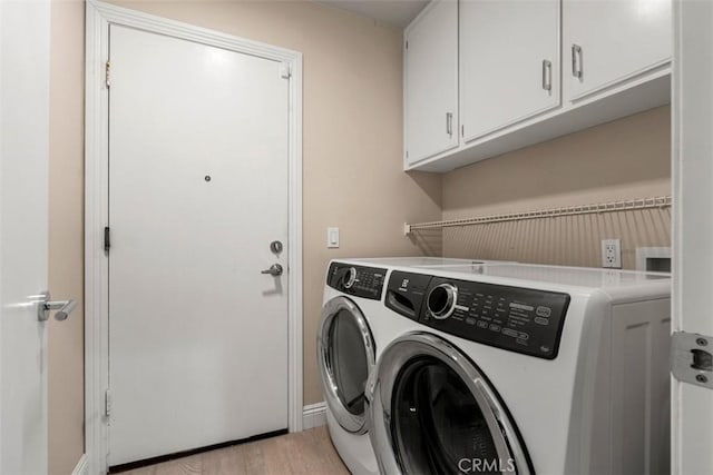 20 Delphinus Unit 20, Irvine, CA 92603 - clothes washing area with cabinet space, baseboards, washer and clothes dryer, and light wood-style floors