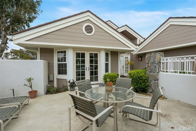 20 Delphinus Unit 20, Irvine, CA 92603 - view of patio with french doors and outdoor dining space