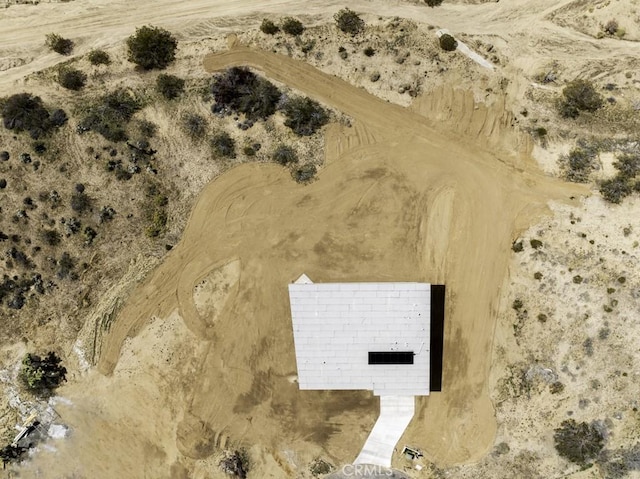 drone / aerial view with a rural view and view of desert