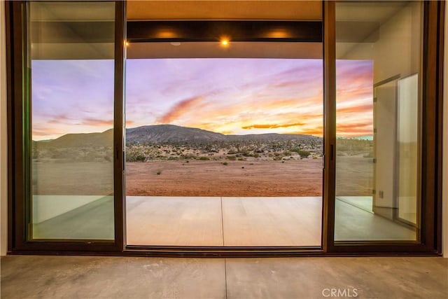 doorway featuring a mountain view
