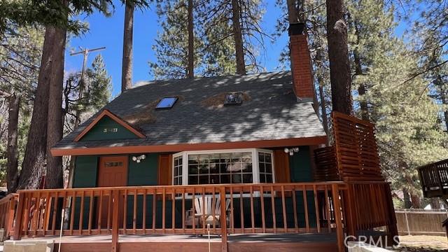 33411 Weeping Willow Dr, Green Valley Lake, CA 92341 - rear view of house with a chimney and roof with shingles