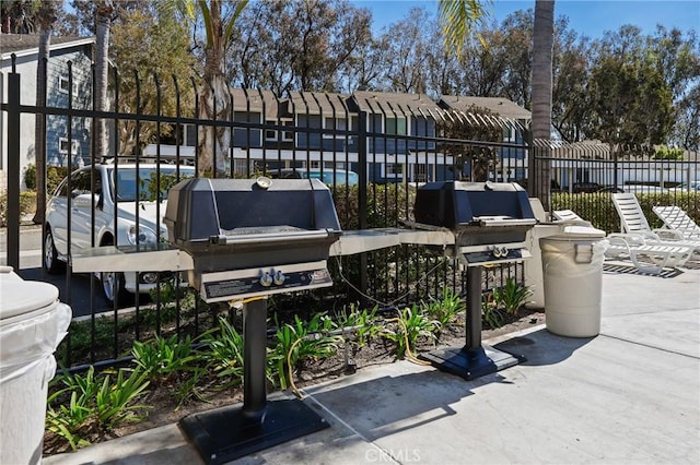 view of patio / terrace with fence and grilling area