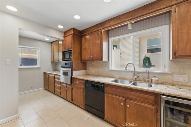 544 Calle Mayor, Redondo Beach, CA 90277 - kitchen featuring black appliances, wine cooler, brown cabinets, and tasteful backsplash