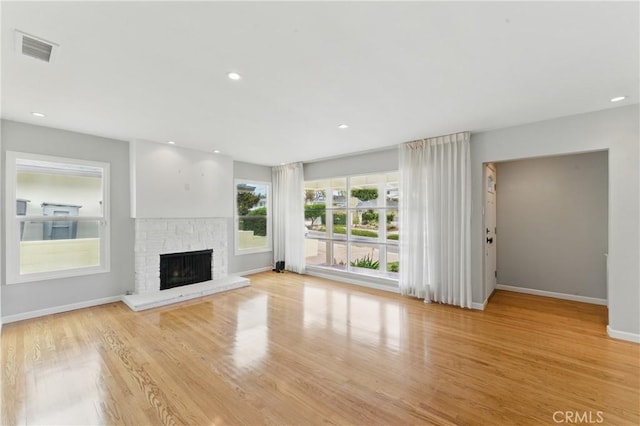 544 Calle Mayor, Redondo Beach, CA 90277 - unfurnished living room with wood finished floors, a fireplace, and recessed lighting