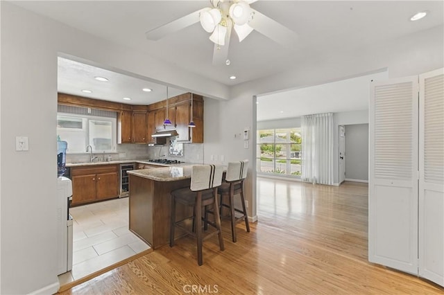 544 Calle Mayor, Redondo Beach, CA 90277 - kitchen with wine cooler, gas stovetop, recessed lighting, a peninsula, and light wood-type flooring