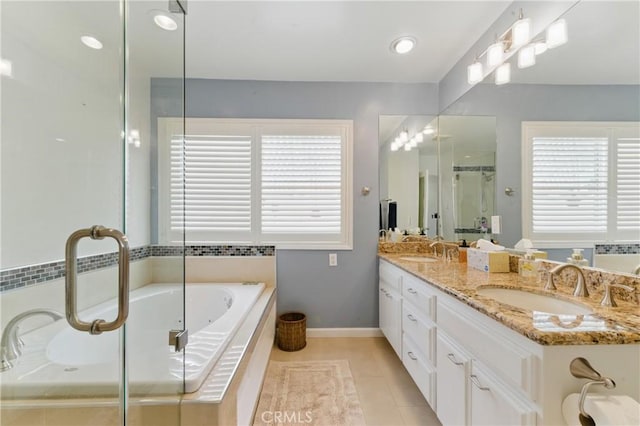 544 Calle Mayor, Redondo Beach, CA 90277 - bathroom featuring double vanity, a garden tub, tile patterned floors, and a stall shower