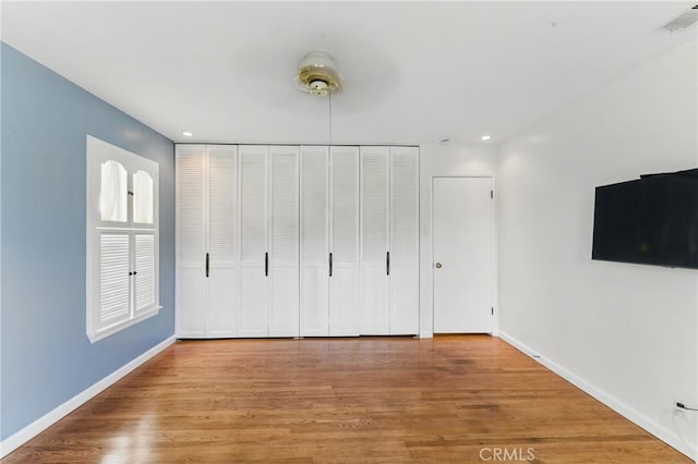 544 Calle Mayor, Redondo Beach, CA 90277 - unfurnished bedroom with wood finished floors, recessed lighting, and a closet