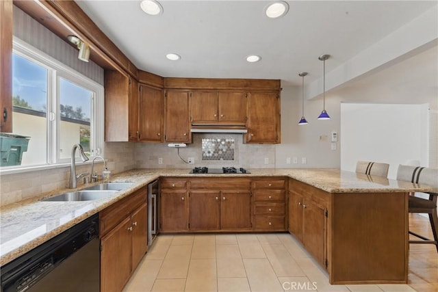 544 Calle Mayor, Redondo Beach, CA 90277 - kitchen with dishwasher, a peninsula, brown cabinets, a kitchen breakfast bar, and decorative backsplash