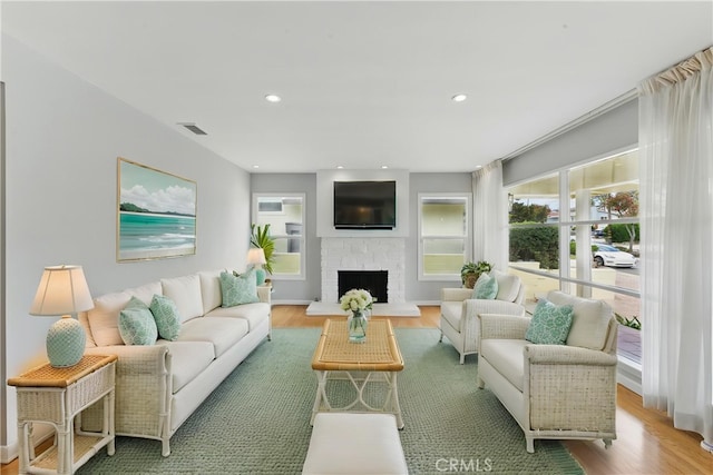 544 Calle Mayor, Redondo Beach, CA 90277 - living room with wood finished floors, a fireplace with raised hearth, and recessed lighting