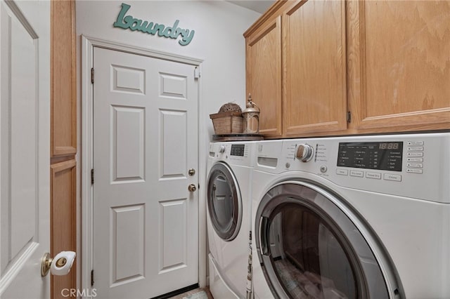 2081 Tangerine Ave, Madera, CA 93637 - laundry room featuring washing machine and dryer and cabinet space