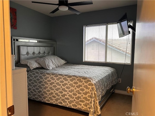 bedroom featuring baseboards, carpet, and ceiling fan