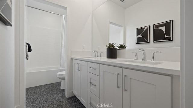 bathroom with a sink, shower / bathtub combination with curtain, toilet, and double vanity