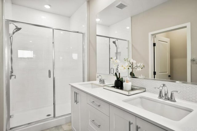 16755 Coyote Bush Dr Unit 32, San Diego, CA 92127 - full bath featuring a stall shower and double vanity