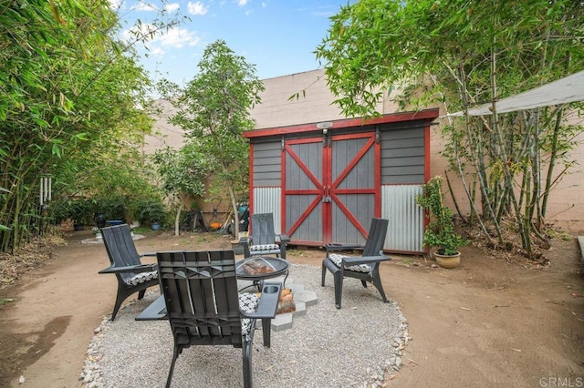 4580 60th St, San Diego, CA 92115 - view of patio featuring a fire pit