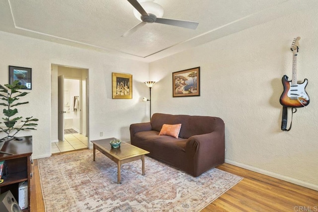 4580 60th St, San Diego, CA 92115 - living area with a ceiling fan, wood finished floors, and baseboards