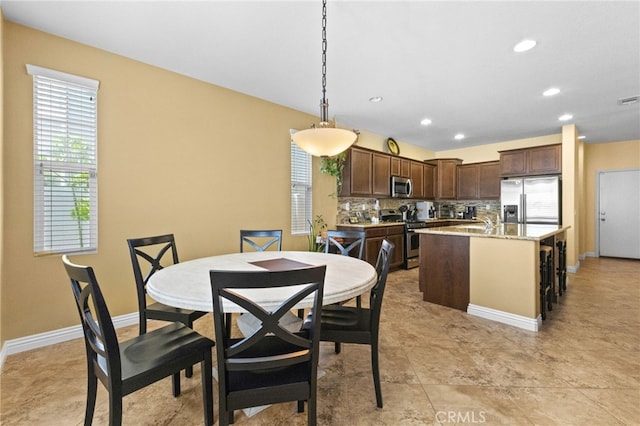 dining room featuring recessed lighting, baseboards, and visible vents
