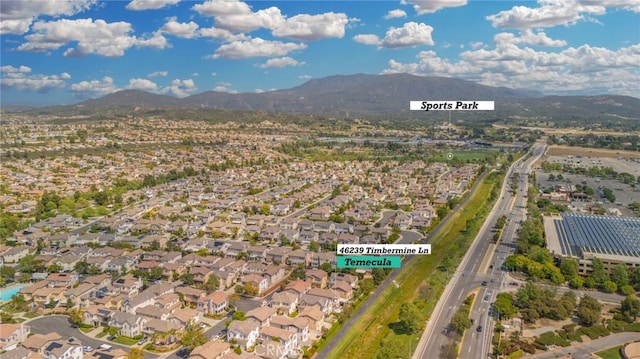 birds eye view of property featuring a residential view and a mountain view