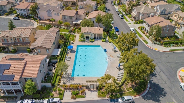birds eye view of property with a residential view