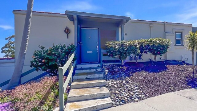 3621 Vista Campana S Unit 56, Oceanside, CA 92057 - property entrance featuring stucco siding