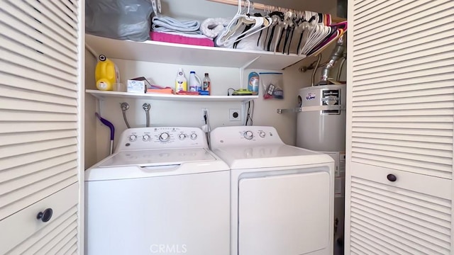 3621 Vista Campana S Unit 56, Oceanside, CA 92057 - clothes washing area with washer and dryer and water heater