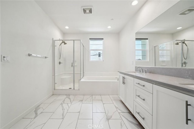 3860 S Oasis Paseo Unit 7, Ontario, CA 91761 - full bath with visible vents, a garden tub, double vanity, a shower stall, and a sink