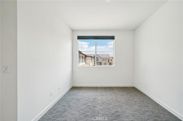 3860 S Oasis Paseo Unit 7, Ontario, CA 91761 - empty room with carpet floors and baseboards