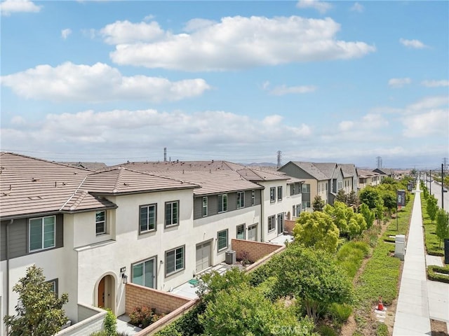 3860 S Oasis Paseo Unit 7, Ontario, CA 91761 - view of building exterior with a residential view and central air condition unit