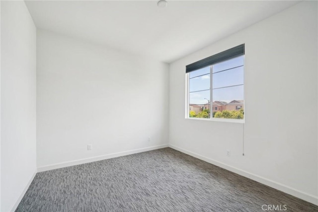 3860 S Oasis Paseo Unit 7, Ontario, CA 91761 - spare room featuring baseboards and carpet floors