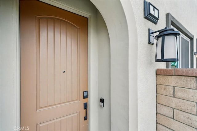 3860 S Oasis Paseo Unit 7, Ontario, CA 91761 - view of exterior entry with stucco siding