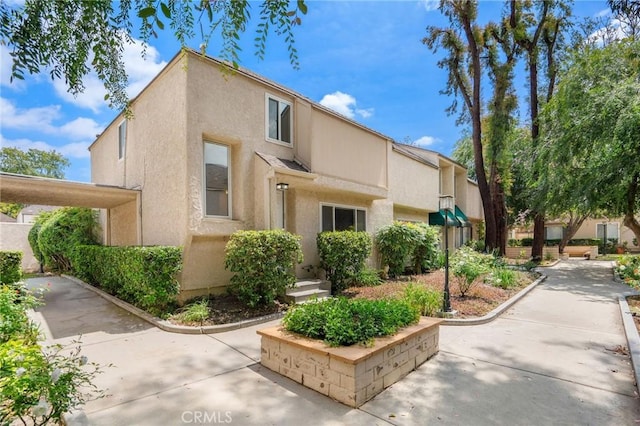 view of property exterior with stucco siding