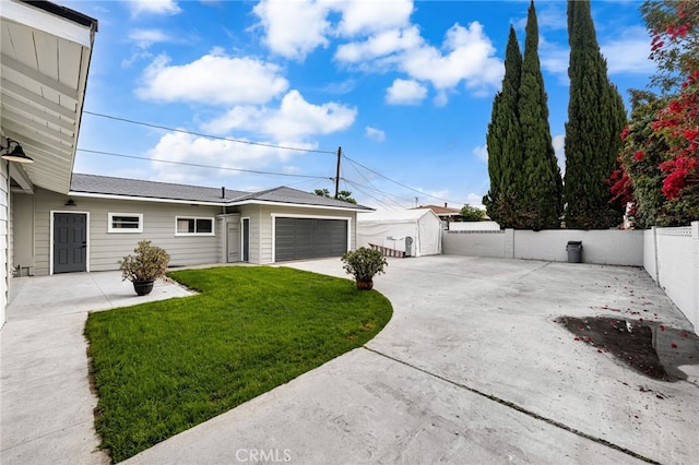 8392 Walker St, La Palma, CA 90623 - view of side of property with a garage and concrete driveway