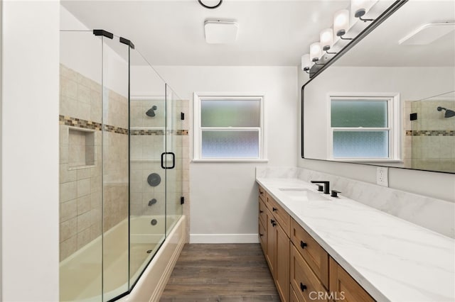 8392 Walker St, La Palma, CA 90623 - bathroom with wood finished floors, vanity, and enclosed tub / shower combo