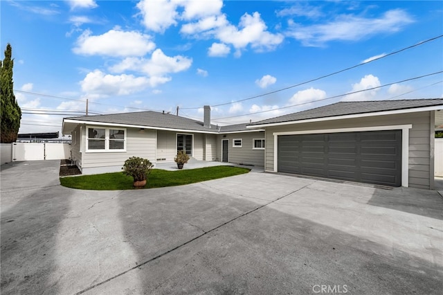 8392 Walker St, La Palma, CA 90623 - ranch-style home with driveway and an attached garage