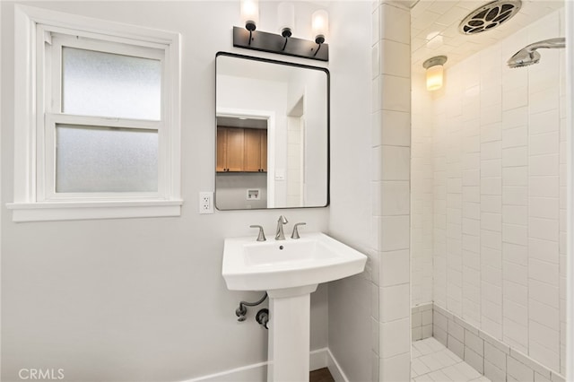 8392 Walker St, La Palma, CA 90623 - bathroom featuring a tile shower and a sink
