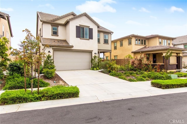 32189 Dymondia Way, Temecula, CA 92591 - view of front of home with stucco siding, an attached garage, concrete driveway, and fence