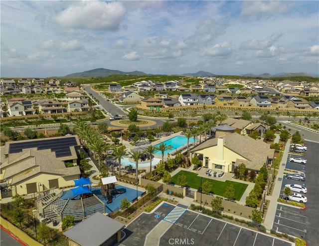 birds eye view of property with a residential view