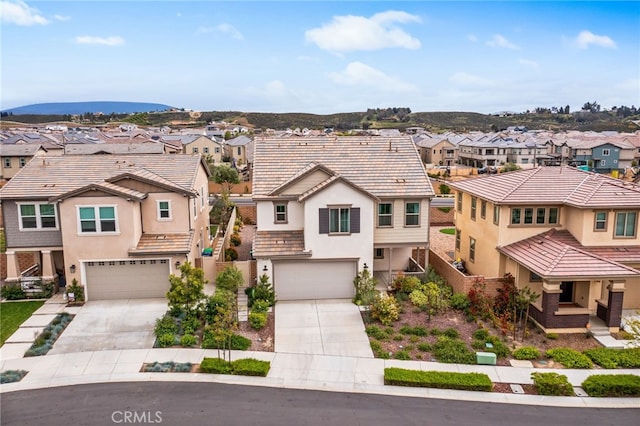32189 Dymondia Way, Temecula, CA 92591 - view of front of home featuring a residential view, stucco siding, a garage, and driveway