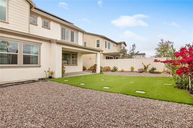 view of yard with a patio and fence