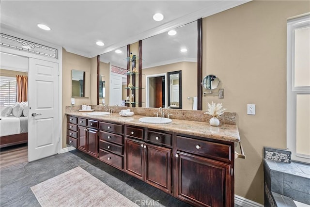 24239 Bella Ct, Newhall, CA 91321 - full bath with ornamental molding, double vanity, ensuite bathroom, and recessed lighting