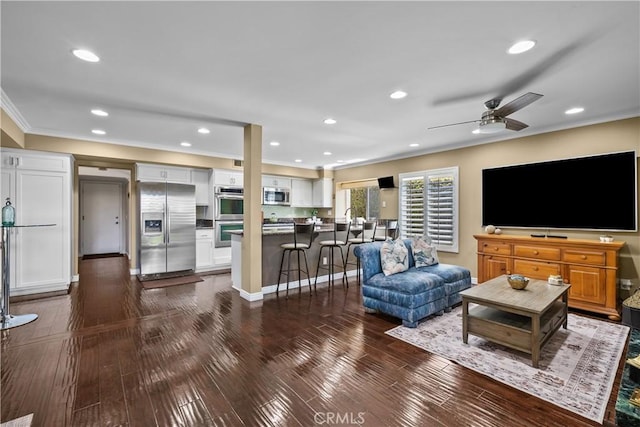 24239 Bella Ct, Newhall, CA 91321 - living area featuring crown molding, recessed lighting, a ceiling fan, and dark wood-style flooring
