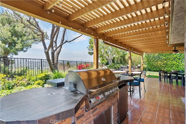 24239 Bella Ct, Newhall, CA 91321 - view of patio featuring outdoor dining area, area for grilling, a fenced backyard, exterior kitchen, and a pergola