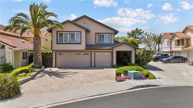 24239 Bella Ct, Newhall, CA 91321 - view of front of house with an attached garage and concrete driveway