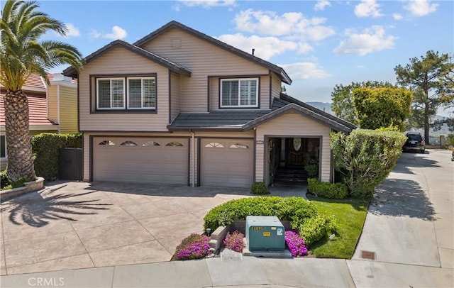 24239 Bella Ct, Newhall, CA 91321 - view of front of house with driveway and a garage