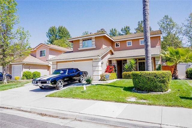 traditional-style house with stucco siding, concrete driveway, a tile roof, and a front yard