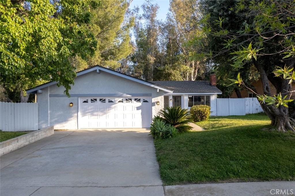 4085 Bayberry Dr, Chino Hills, CA 91709 - single story home featuring an attached garage, concrete driveway, and stucco siding