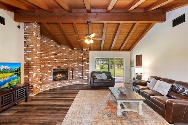 living room with vaulted ceiling with beams, a ceiling fan, wood ceiling, and dark wood finished floors
