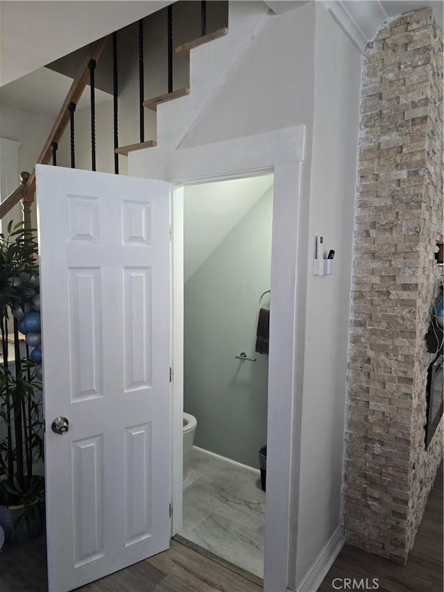 624 Cedar Ave, Long Beach, CA 90802 - stairs featuring wood finished floors and baseboards