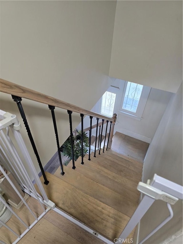 624 Cedar Ave, Long Beach, CA 90802 - stairs featuring wood finished floors
